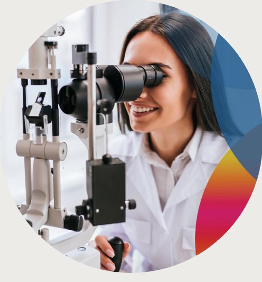 An optometrist examines a patient's eyes.